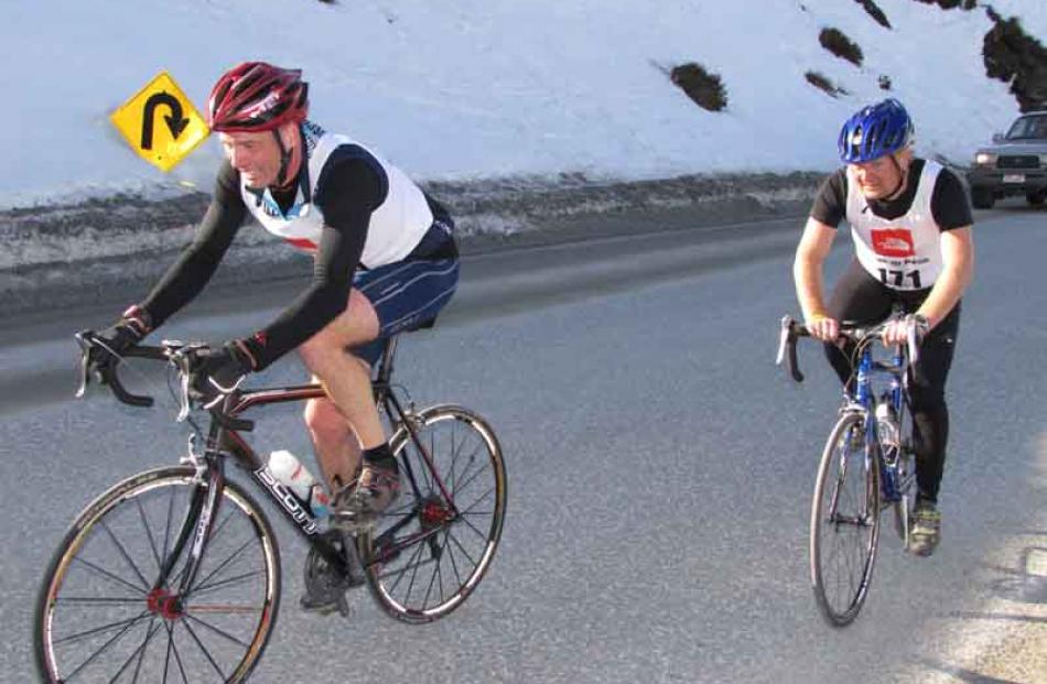 Christchurch multi-sportsman Ian Huntsman, of team Huntsman-Riach, ahead of Cedric Maret, of team...