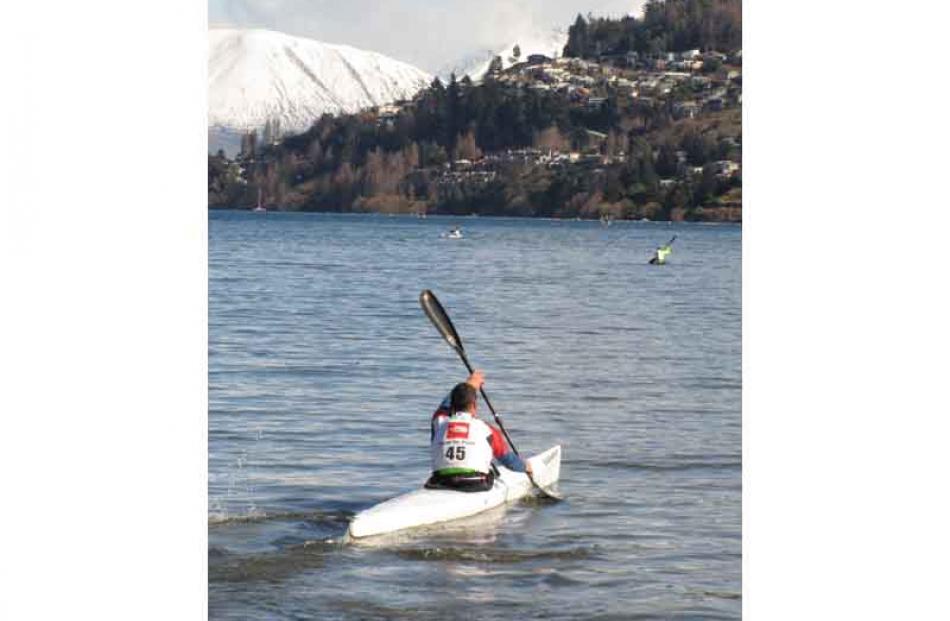 Aaron Nash, of Queenstown, competing in the men's open division, heads for Queenstown Bay.