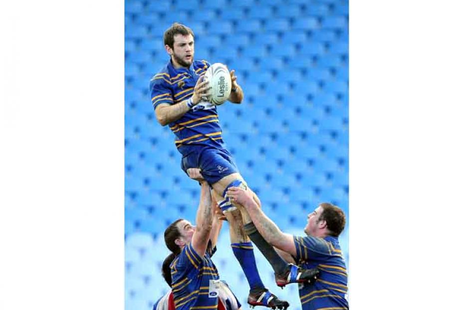 Taieri number 4 Matt Larson takes the lineout.