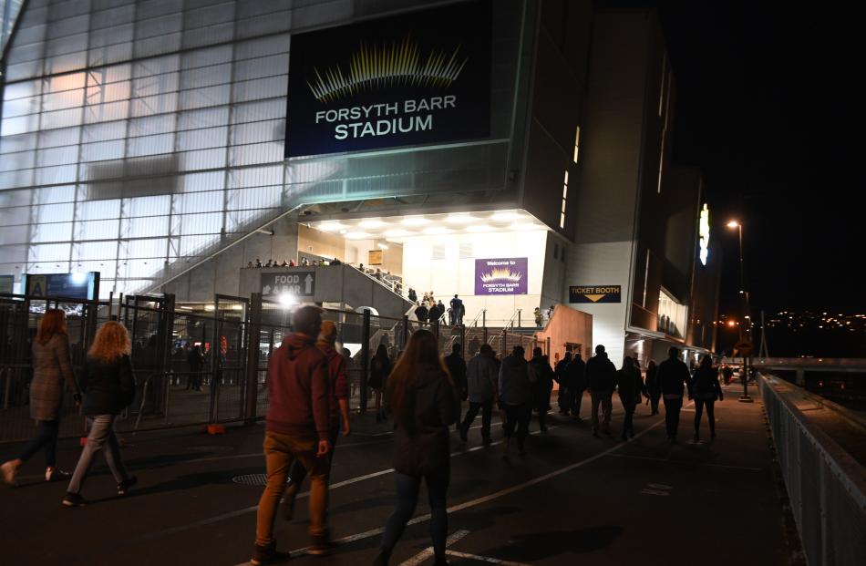 Punters make their way into the stadium. Photo: Linda Robertson