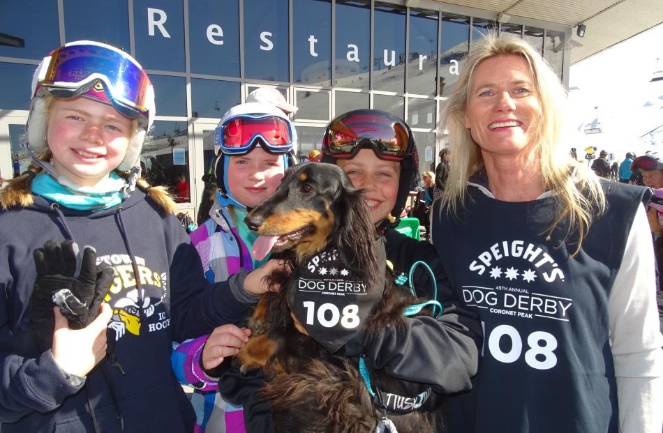 Polly Bennetts (11), Amber Dow (12), Lani Thomas (11), Charlotte Mill, and Neo the dachshund, all...