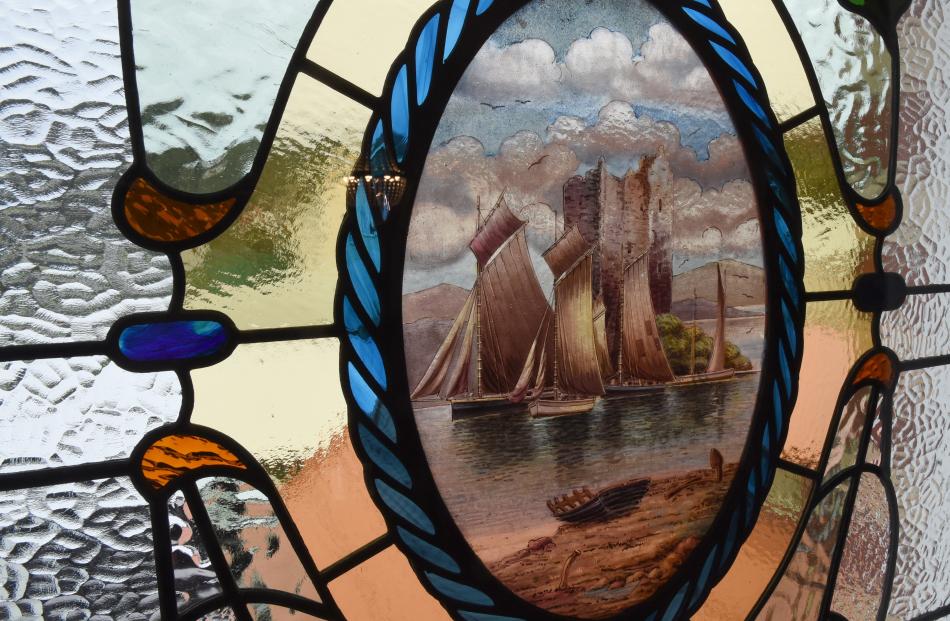 Dunedin stained-glass artist Kevin Casey took this piece of painted glass from an old damaged...