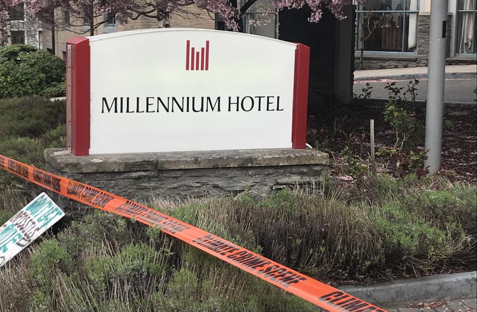 About 35 protesters are stationed in front of Queenstown’s Millenium Hotel, showing their...