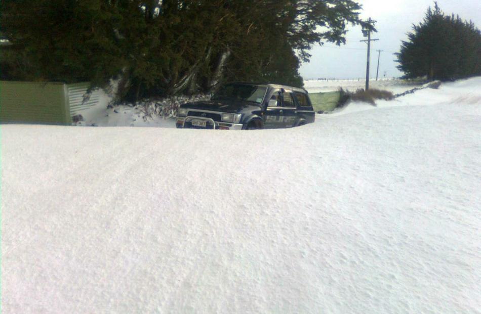 A snowdrift on Purakanui road near Heyward Point road this morning. Photo Lionel Carr