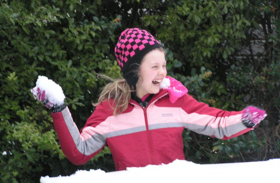 Emily Paterson during a snow fight in Waverley. Photo by Glenda Paterson.