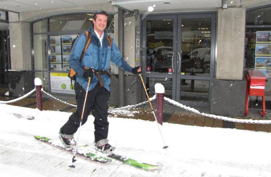 Nick Eyre, from Queenstown, skied from the suburb of Goldfield Heights to work at Hoamz,...
