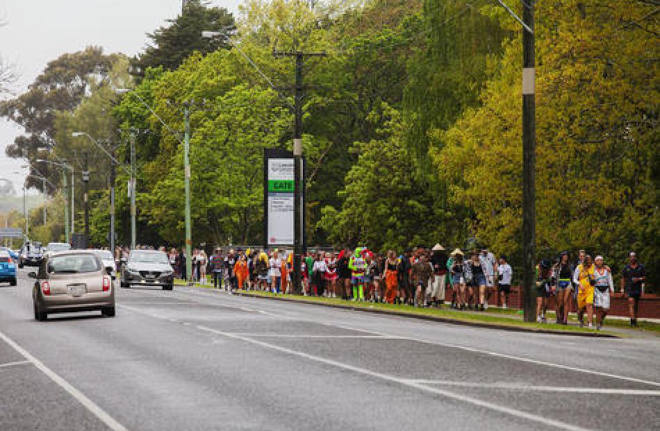 Lincoln University students marching to the Garden party on Ellesmere Junction Road. 