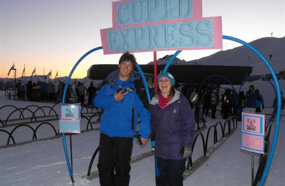 Laura Newton and Mitchell Higgenson, of Queenstown, hop on the Cupid Express.