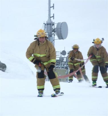 Frankton's all-skier team making its way down Coronet Peak, led by Bobby Lamont, then Paul...