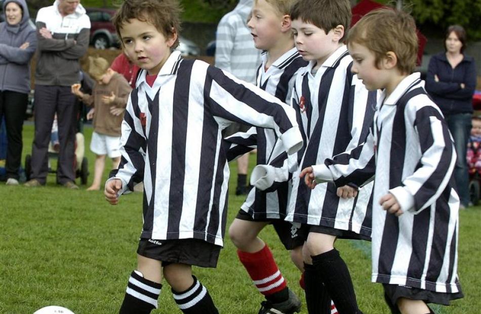 5th grade Northern Jack Paris (5) with ball supported by Finn Abbey (5), Noah Taylor (5), Jack...
