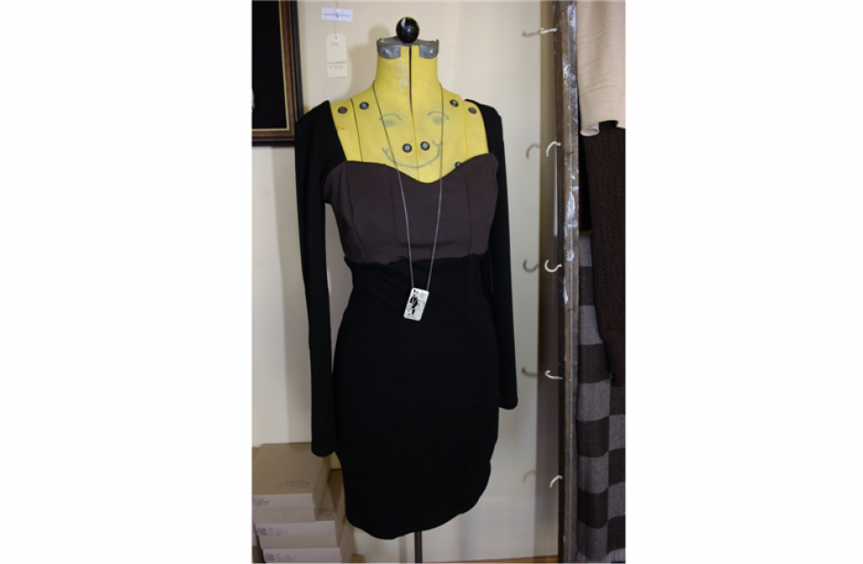"Body con" dress by Philippa & Alice, Wellington, and Banksy hand-chiselled pendant by Divine...