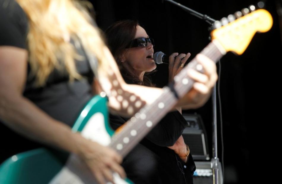 Belinda Carlisle (R) of US rock band The Go-Go's performs during a sound check ahead of the band...
