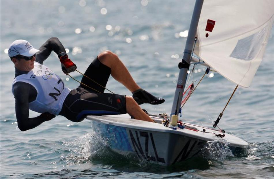 New Zealand's Andrew Murdoch competes during race one of the Laser class sailing competition. (AP...