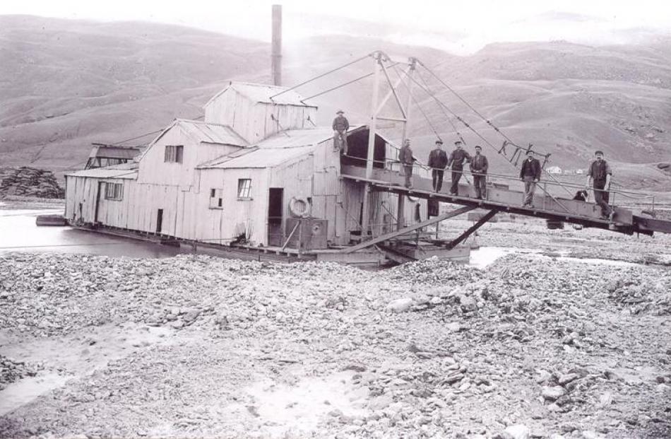 On the dredge 'Crewe No 2' in the upper Nevis Valley in 1903 are (from left) Jack McNulty, Harry...