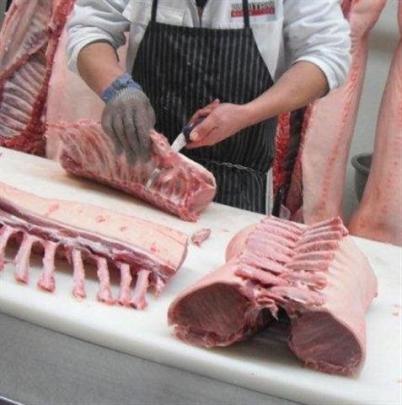 Pork French racks are prepared for Waitaki Bacon and Ham.