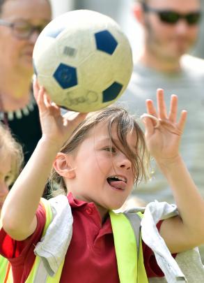 Musselburgh School pupil Lilly MacDonald (7) throws a ball during the safari fun day.

