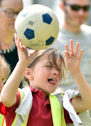 Musselburgh School pupil Lilly MacDonald (7) throws a ball during the safari fun day.

