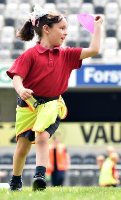 Musselburgh School pupil Nevach Ropata (6) fetches a kicking tee.
