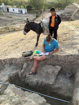 Academic Ladislav Damasek from Charles University in Prague records the archaeological site on...