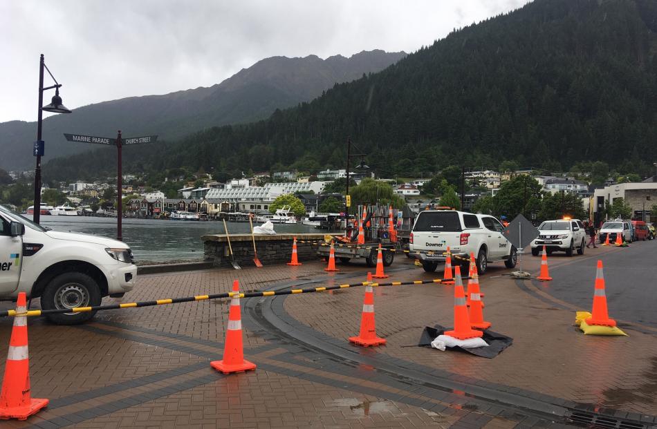 Council contractors have been putting sandbags and cordons in place this morning. Photo: Louise Scott