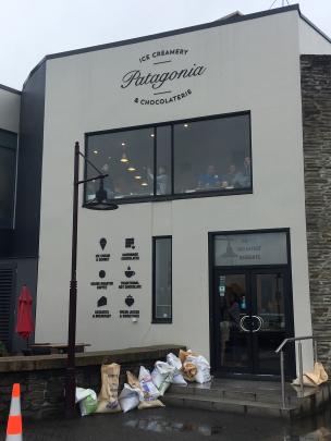  Some Queenstown businesses have put some sandbags in place. Photo: Louise Scott