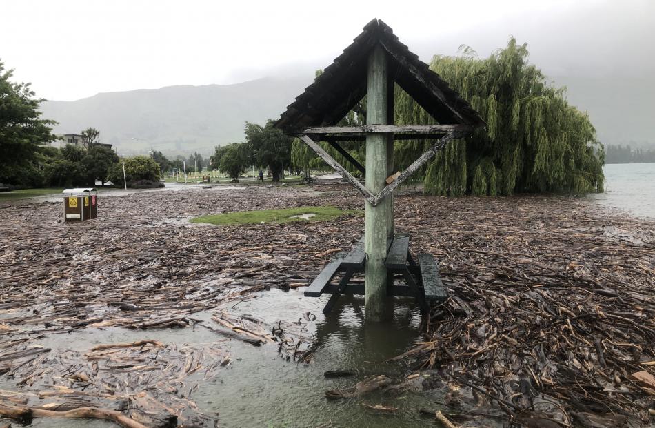 Water floods areas near the lakefront in Wanaka this morning. Photo: Kerrie Waterwroth