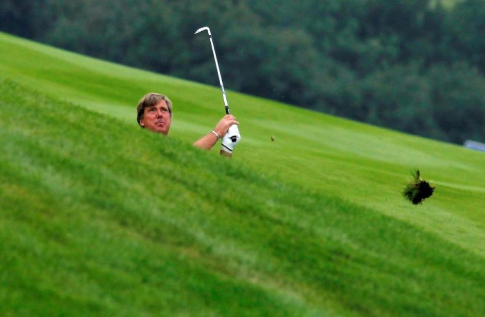 Barry Lane of England watches his shot on sixth hole at the European Seniors Tour Casa Serena...