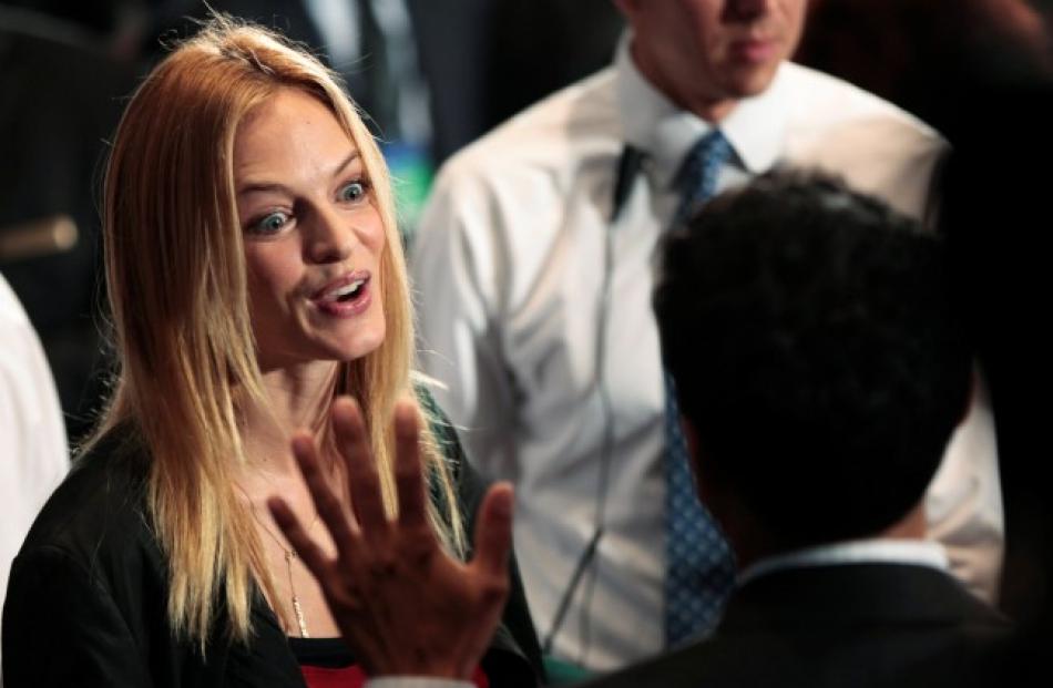 Actress Heather Graham speaks to a member of the audience before a speaker during the Clinton...