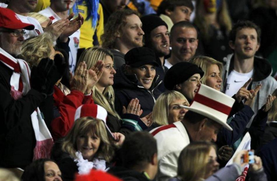 Zara Phillips, centre, soaks up the action. REUTERS/Brandon Malone