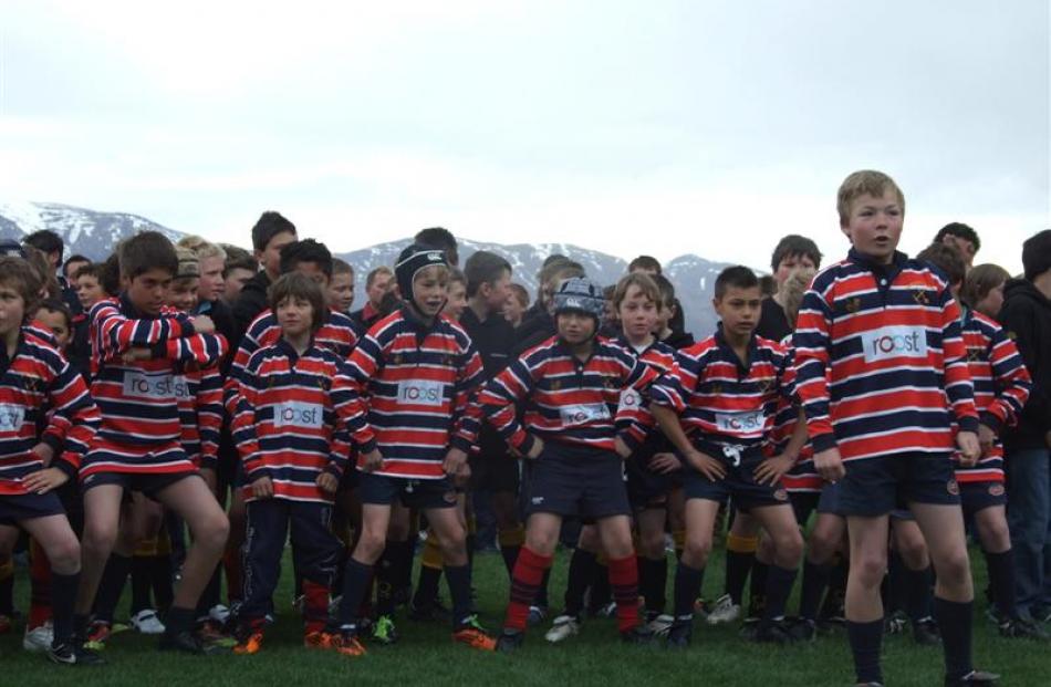 Cam Parnell (11), of Arrowtown, leads Saturday morning's mass haka, supported by the rest of the...