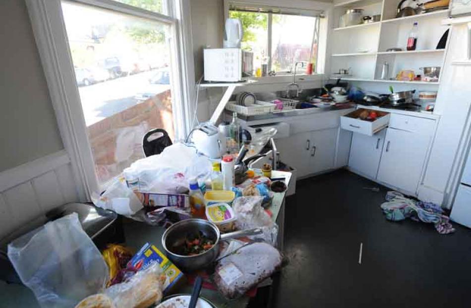 Beneath the mess is probably a semi-decent kitchen at 49 Brown Street, an entrant in the messy...