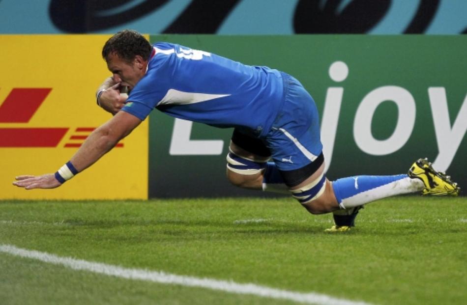 Namibia's Heinz Koll scores a try during their Rugby World Cup Pool D match against Wales at...