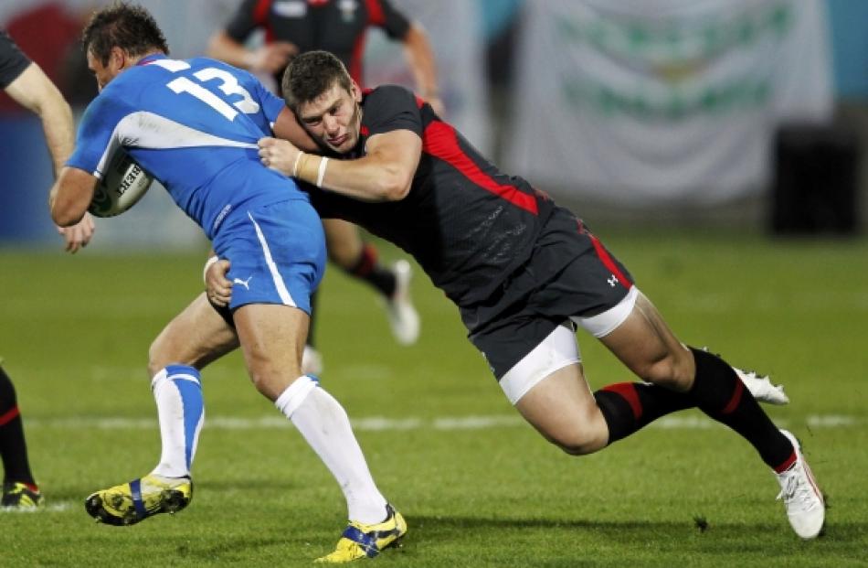 Wales' Scott Williams (right) tackles Namibia's Piet Van Zyl during their Rugby World Cup Pool D...