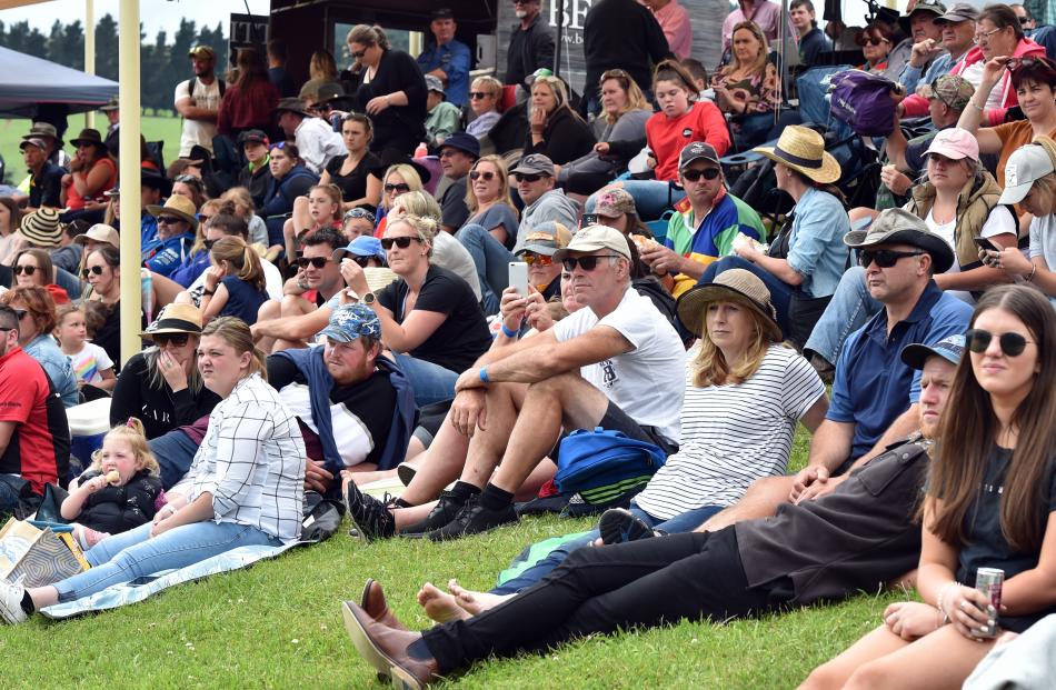Some of about 1000 people who braved the odd shower to enjoy the 56th Millers Flat Rodeo...