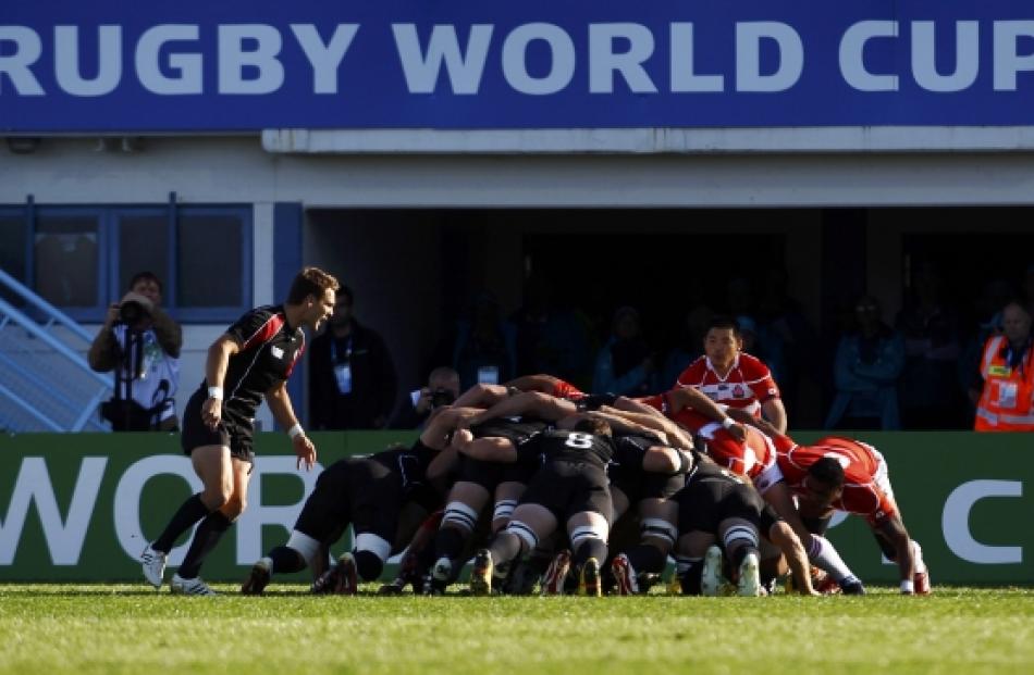 Canada and Japan players contest a scrum during their Rugby World Cup Pool A match at McLean Park...