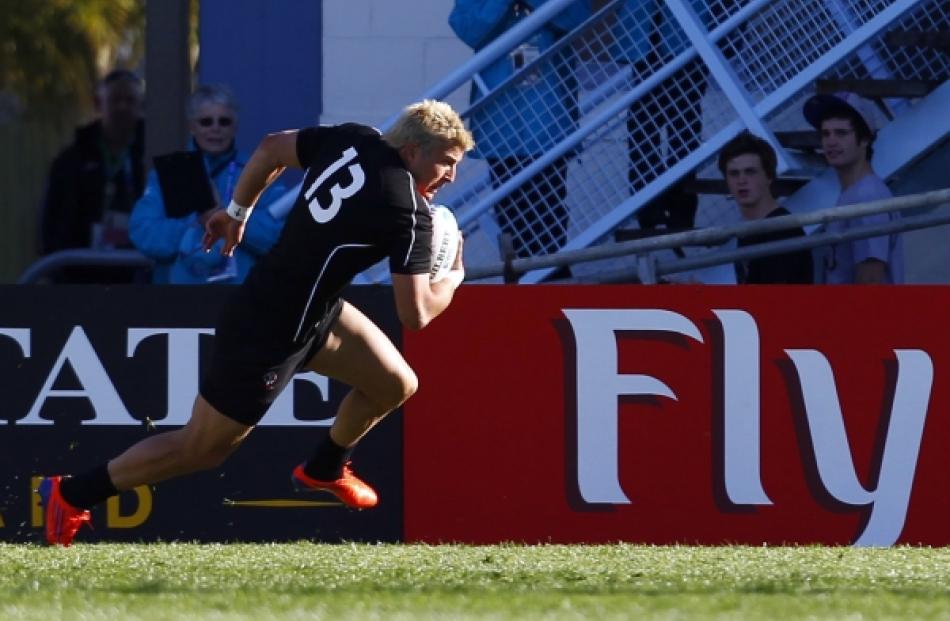 Canada's DTH van der Merwe heads for a try during their Rugby World Cup Pool A match against...