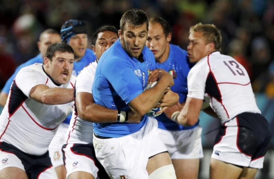 Italy's Quintin Geldenhuys attempts to break free from a maul during their Rugby World Cup Pool C...