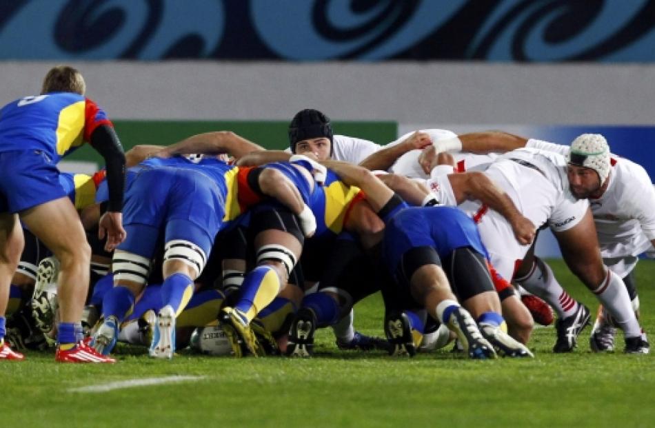 Georgia's Dimitri Basilaia (centre) looks over a scrum during their Rugby World Cup Pool B match...