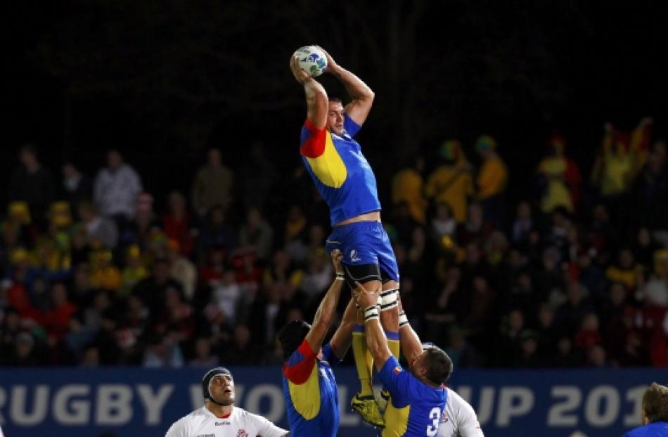 Romania's Cristian Constantin Petre wins a line out during their Rugby World Cup Pool B match...