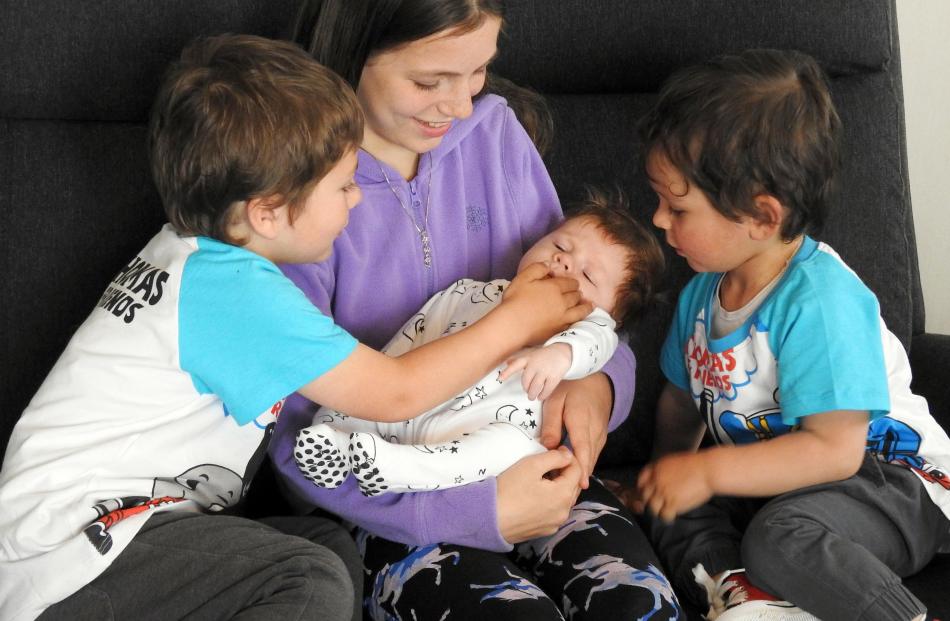 Cousins Kyle (4), Autumn (11), Bennett (2 months) and Lachlan (2) Bray get together after...