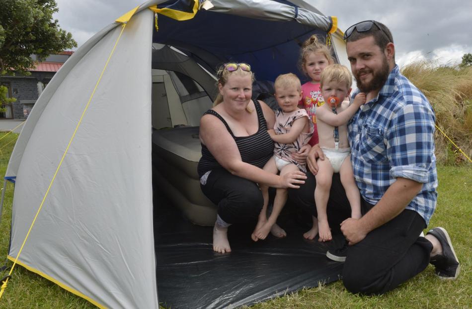 Getting away from the farm for a few days are the Baldwin family (from left) Roberta, Carter (1),...