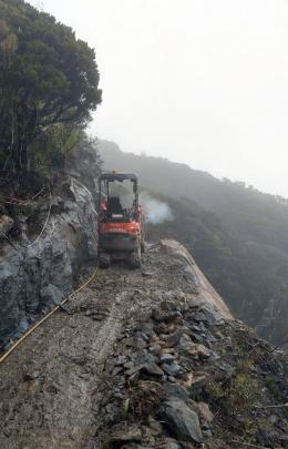 Westreef track crews clawed and blasted the track around the edge of the Paparoa Escarpment....