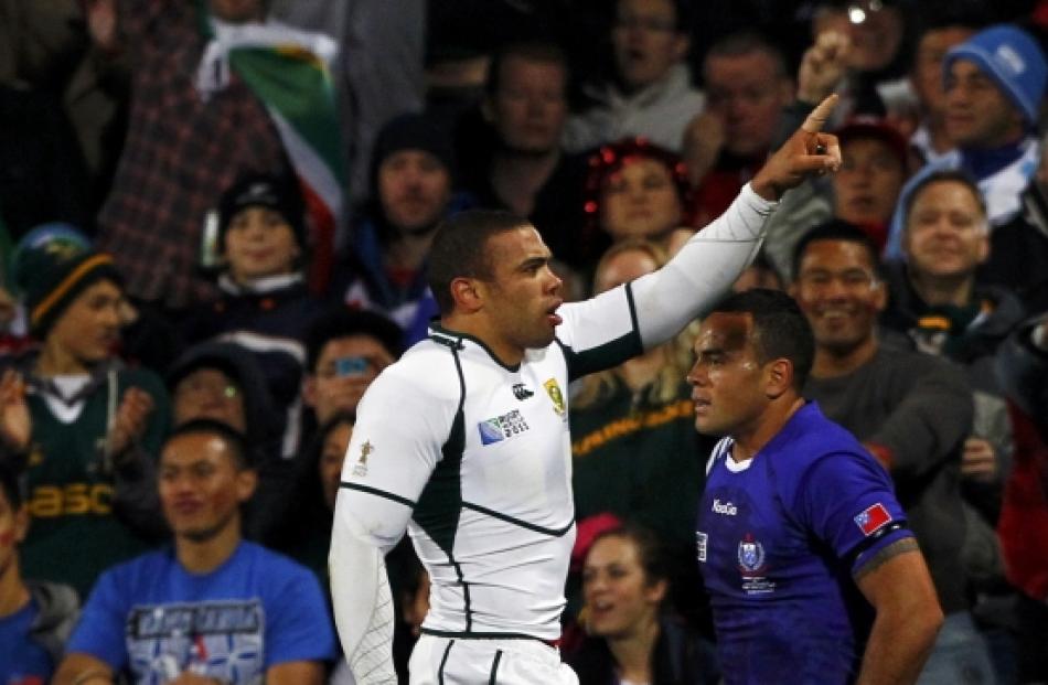 South Africa Springboks' Bryan Habana celebrates after scoring a try during their Rugby World Cup...