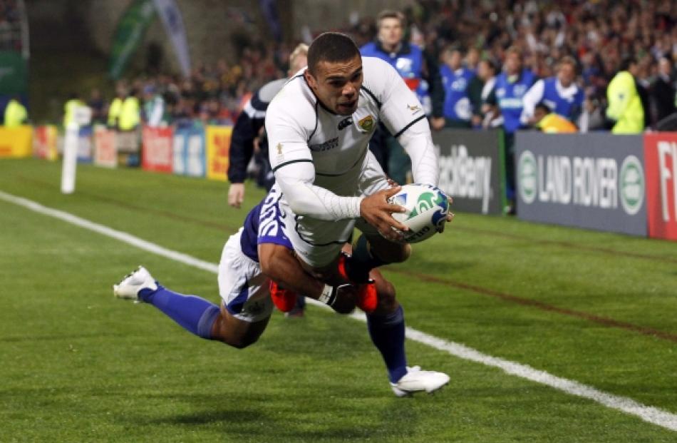 South Africa Springboks' Bryan Habana scores a try during their Rugby World Cup Pool D match...