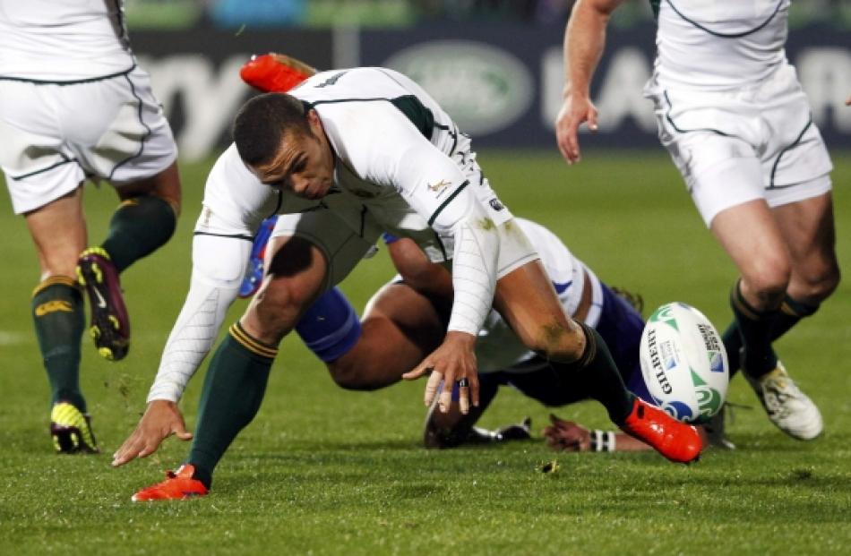 South Africa Springboks' Bryan Habana struggles to control the ball during their Rugby World Cup...