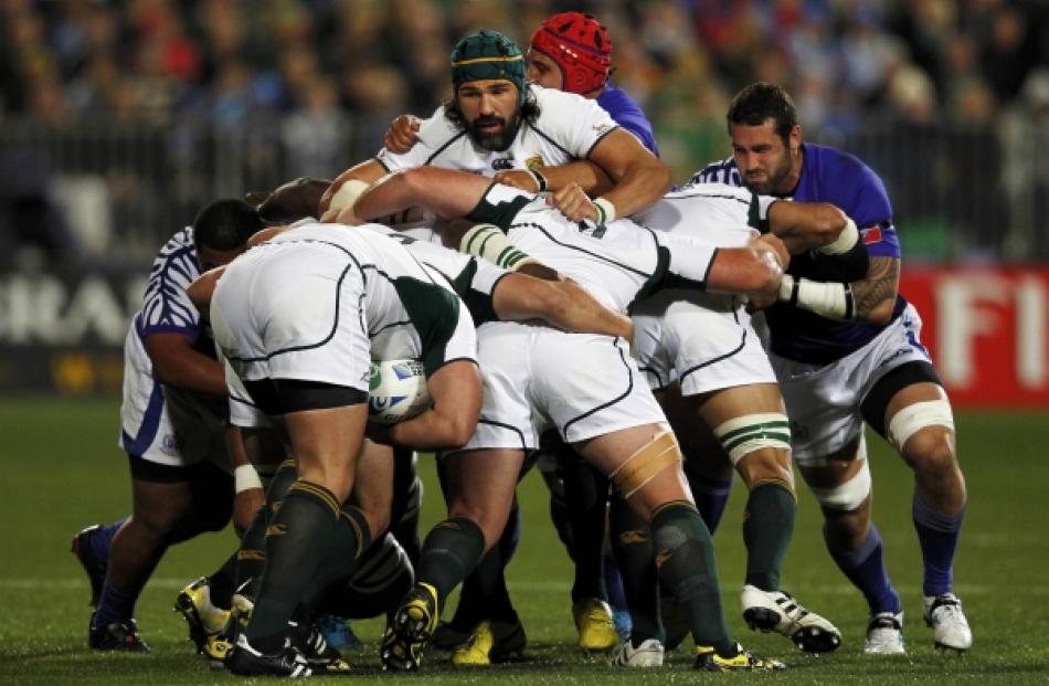 South Africa Springboks captain Victor Matfield (centre) works in a maul during their Rugby World...