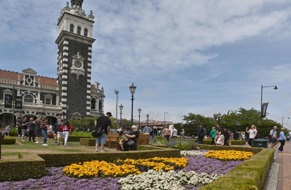 A crowd of cruise ship passengers enjoy the sights at the Dunedin Railway Station yesterday.
