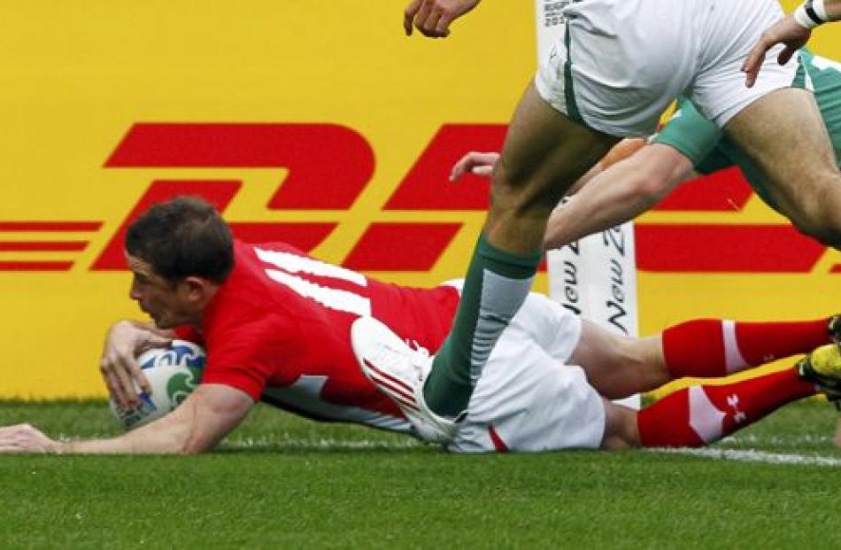 Wales' Shane Williams scores a try during their Rugby World Cup quarter-final match against...