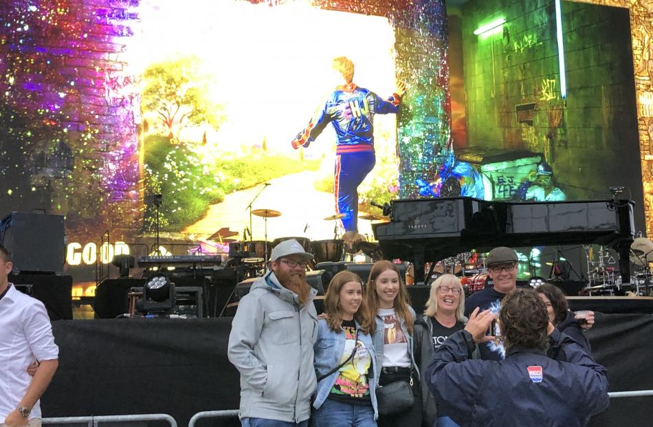 Fans get photos taken before the concert. Photo: Supplied