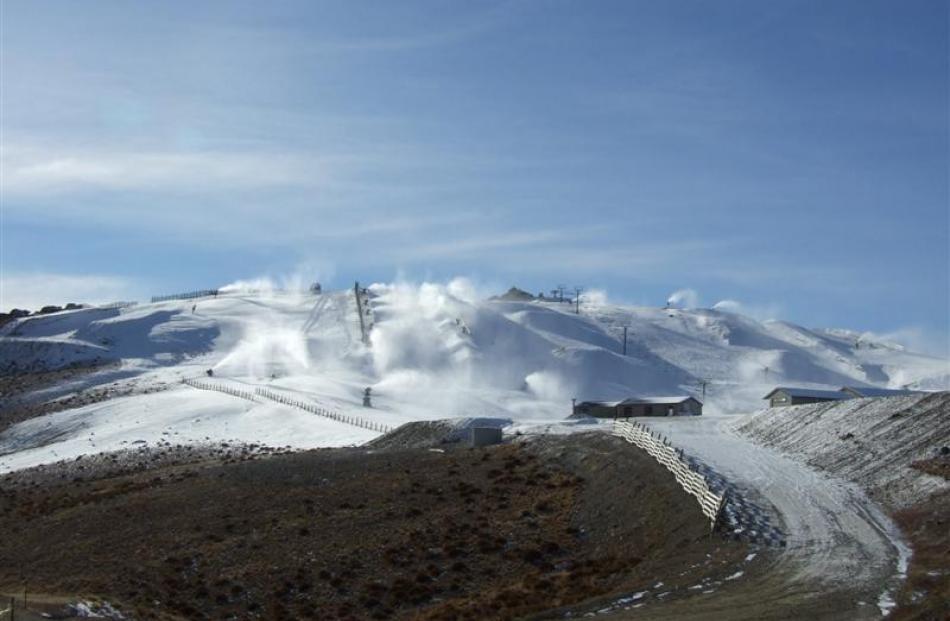 Snowguns fire up at the adjacent Snow Park.